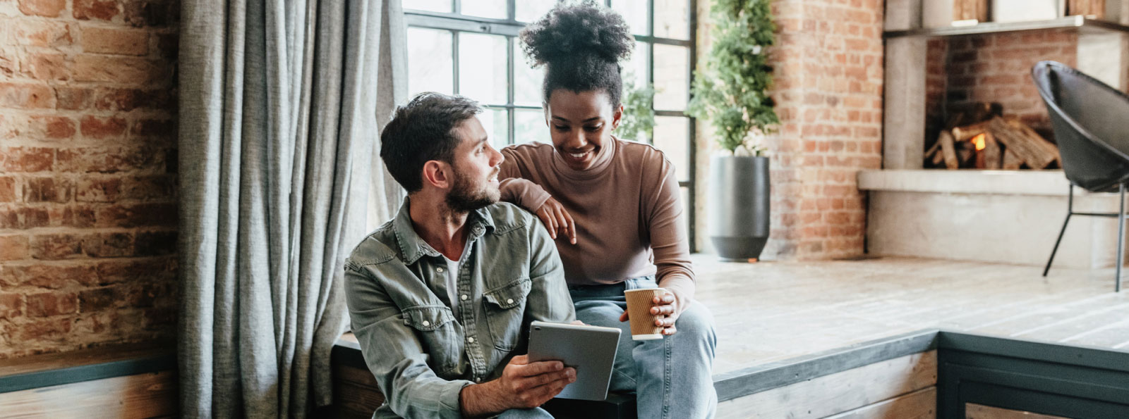 couple looking at tablet